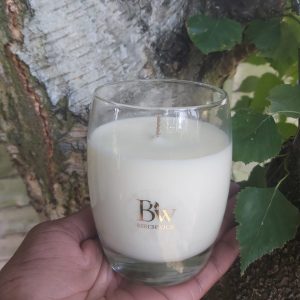 Birchwick candle in a curved glass jar.